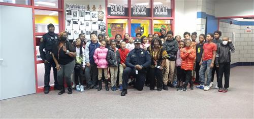 The Chief Poses with 5th Grade Students
